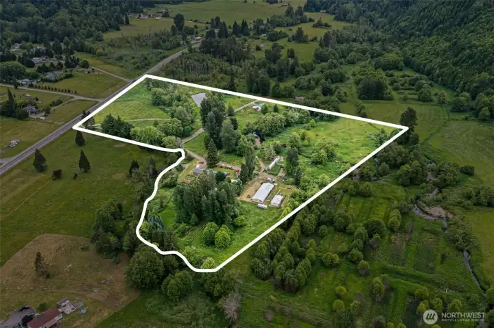 Over 21 acres with Rainy & Lunch Creek running through as well as a pond
