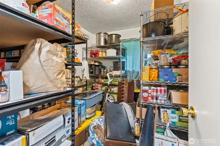 Smaller 3rd bedroom used for secondary pantry
