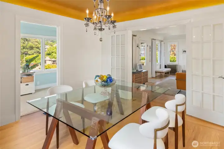 Formal dining room open to living area and solarium office.