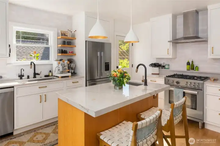 Chef’s kitchen showcases premium appliances, custom finishes, and impeccable detailing.