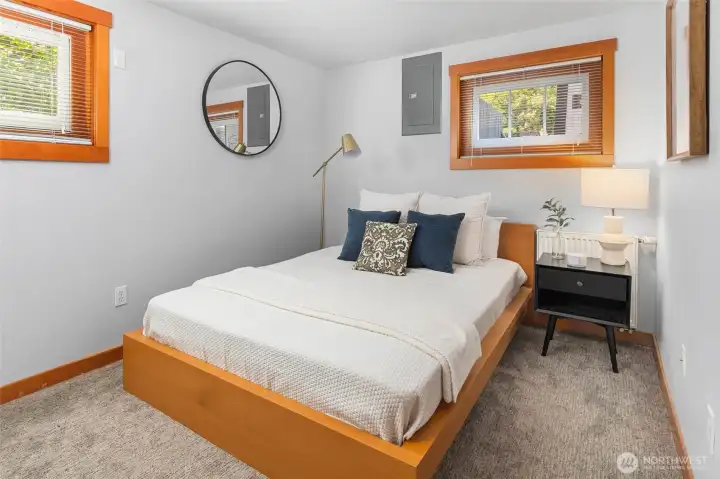 Spacious lower level bedroom. Not shown is a 3/4 bathroom w/steam shower.