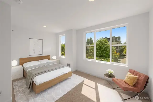 The top primary-level suite finishes off the home with its vaulted ceilings, abundance of windows and spa-like bathroom.  Photos are virtually staged and of a similar home in Willow North.