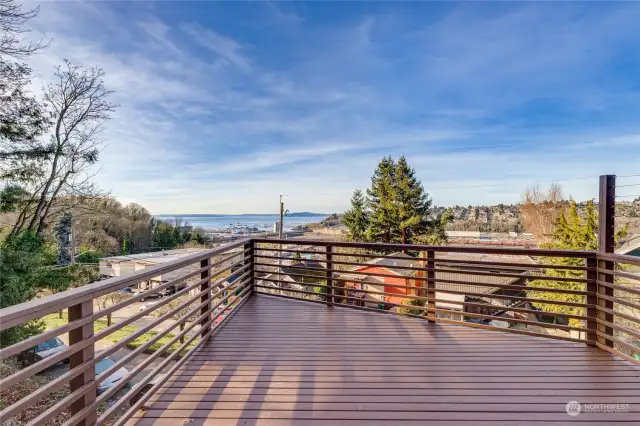 The oversized main floor deck offers easy access with no steps and breathtaking views of the sound and mountains!