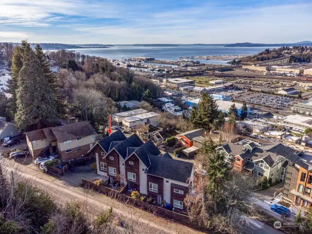 Ariel view shows the awesome location overlooking Elliott Bay and the Olympic Mountains!