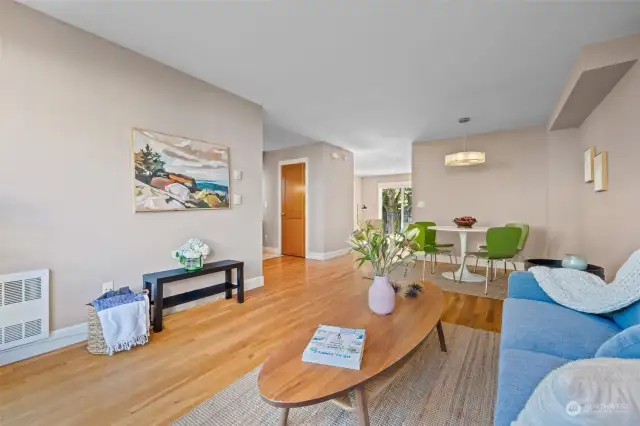 Main living room with adjacent dining area.