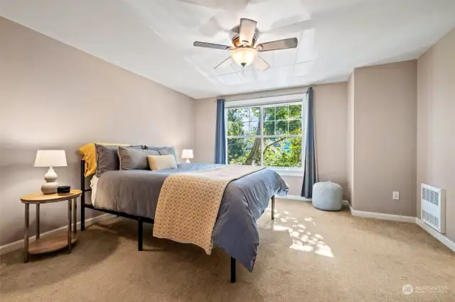 Primary bedroom with attached bath & new walk-in shower.