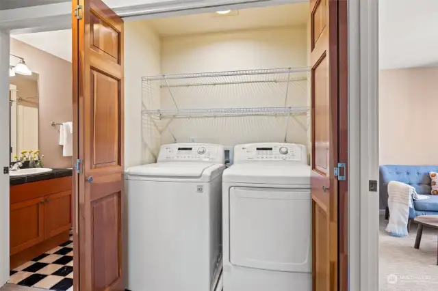 Laundry area between 2nd bedroom & guest bath on top floor.