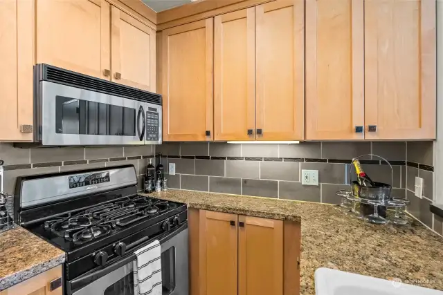 You'll swoon for the gas range, undercount lighting and custom cabinets.  All appliances included with this sale