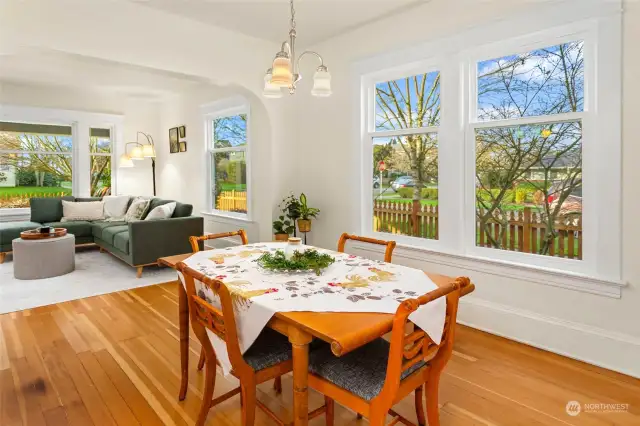 Check out all the beautiful large windows and refinished original flooring throughout the home.