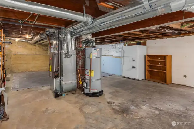 Large unfinished basement with new furnace, central AC, and washer/dryer.