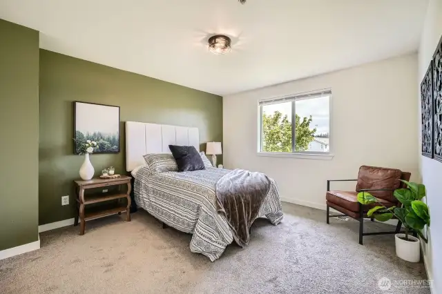 Primary bedroom is very spacious and has ample natural light.