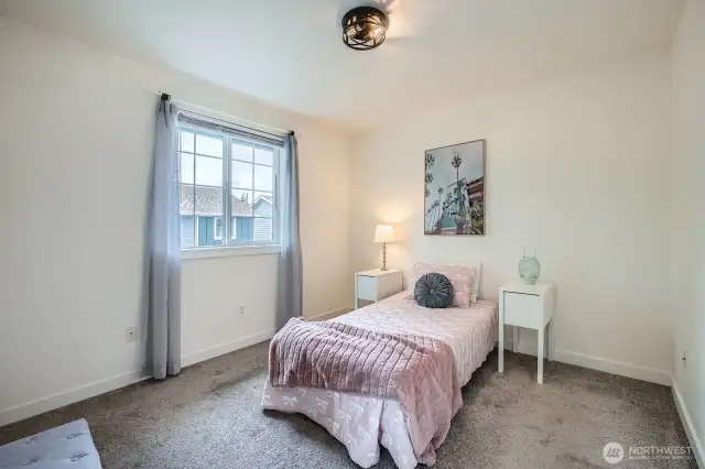 Second bedroom has great size for a full-size bed. There is no room in this house that is is not graced with natural lighting!