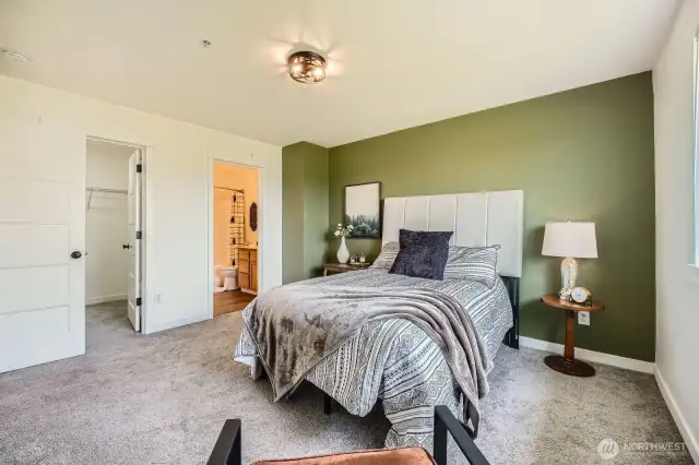 3 OF 5 TOP PHOTOS: Spacious primary bedroom with walk-in closet and full size bathroom.