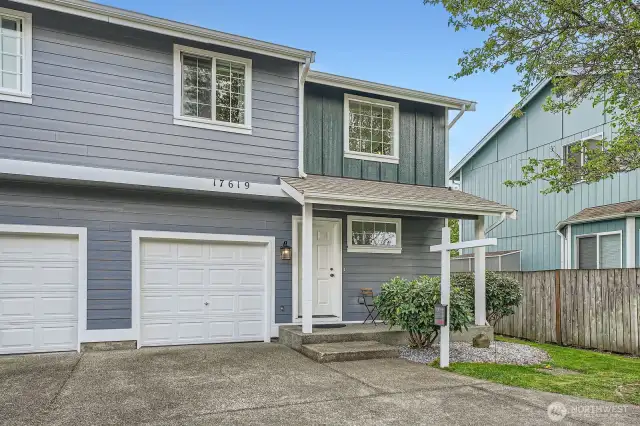 One-car garage plus one-car driveway spot graces this townhouse.