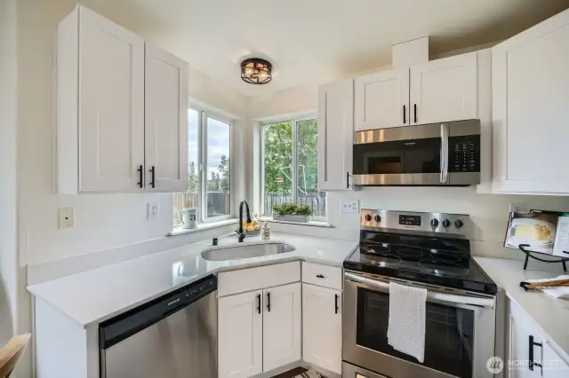 Lots of natural light in this kitchen. And you can see Mount Rainier while washing dishes.