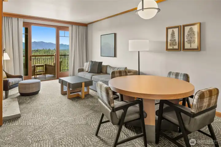 living/dining area with balcony and views forever!