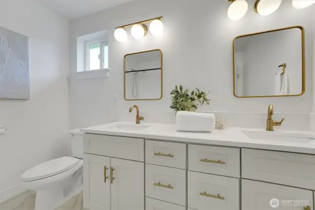 Primary ensuite, double vanity, ceramic tile floors, quartz counter, gold fixtures