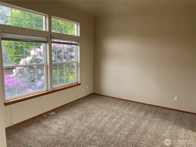 Family room with wood burning fireplace