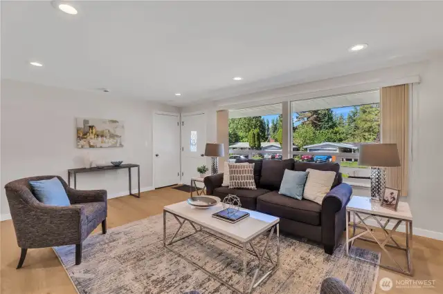 Sunny and bright with a spacious living area welcomes you and your guests.  Closet at front door for coats, umbrellas, boots and more.