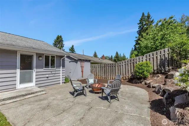 The yard is fenced on 3 sides, so an easy, small area to create a fully-fenced yard for a pet or tiny humans.  There are two structures adjacent to the house that have been used for additional storage.