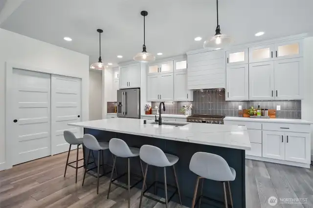 Clean, crisp kitchen with extended lighted cabinets