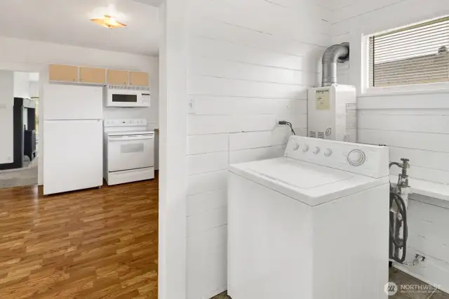 Laundry room off kitchen.