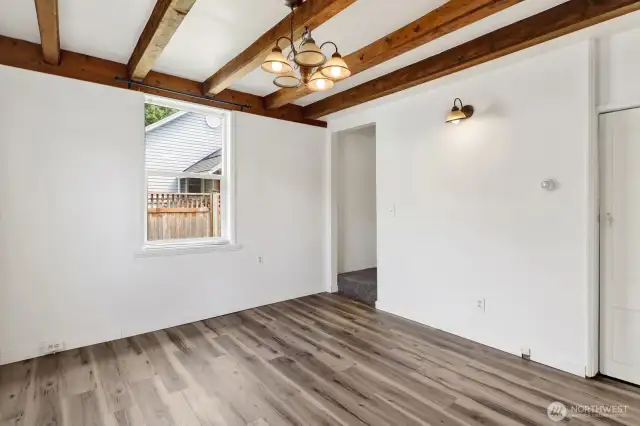 Living room with wood beams add character.