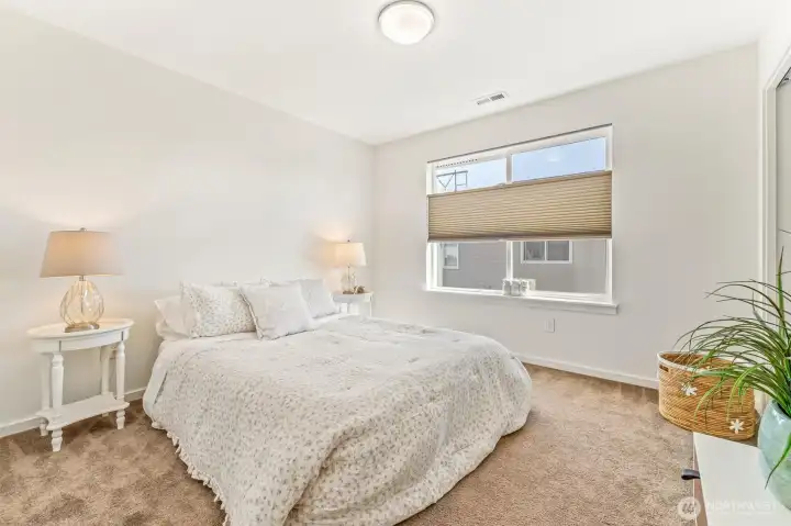 Another of the four upstairs bedrooms.