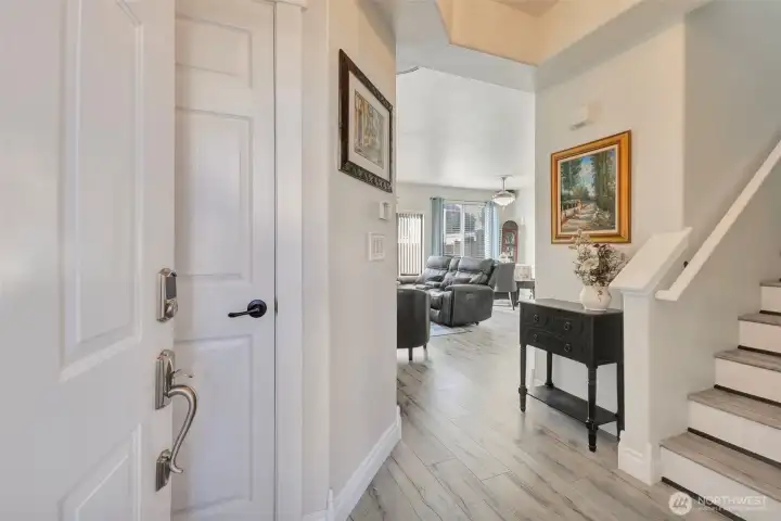 Spacious entry leads you into main living area with coat closet