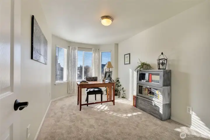 Bedroom #3 features bay window, new carpet & pad. Room faces south and has great natural light