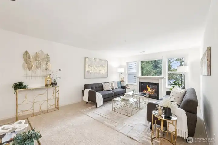 Gas fireplace with lots of windows and views.