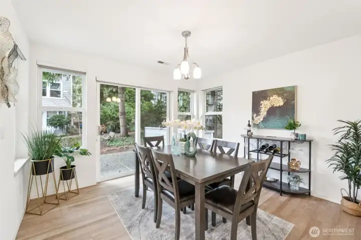 Dining area overlooks patio. This room also makes a great office/nook/sitting room.