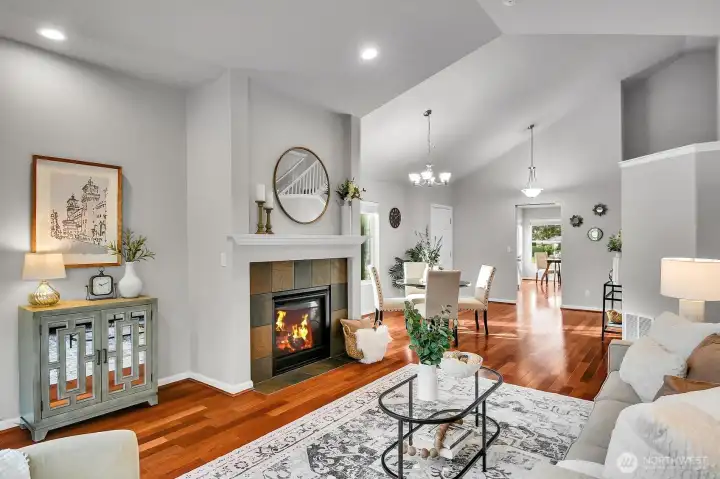 Cozy up to fireplace in living room.