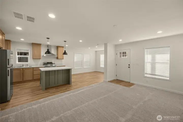 Front door, living room, dining room, and kitchen without virtual staging