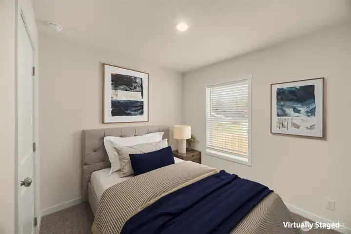 Virtually staged comfortable guest or flex bedroom