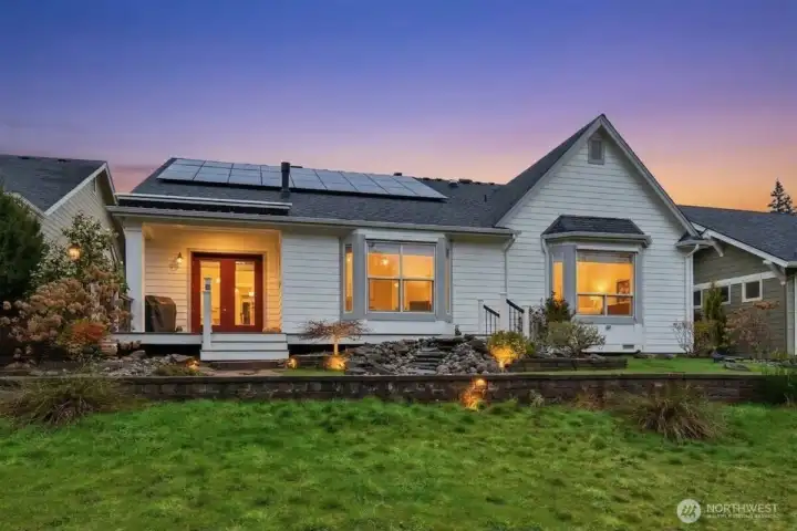 Aglow, set back from the Fairway.