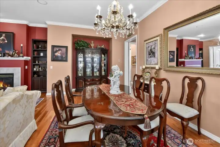Elegance abounds with a stately chandelier, China cabinet, and whole-house sound system to set the mood.