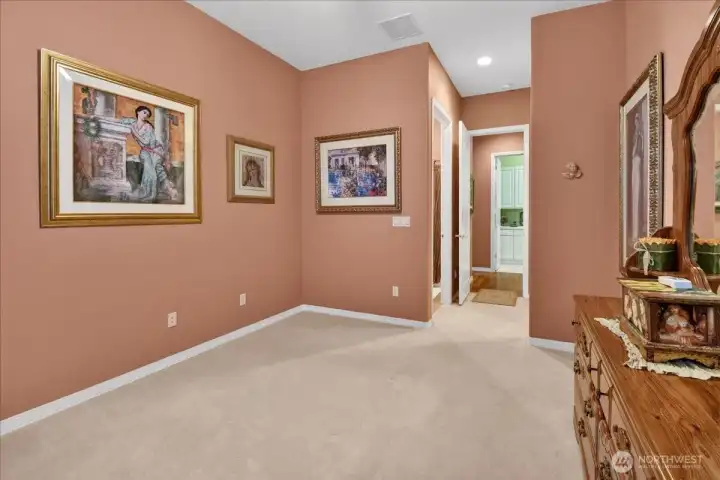 Guest Room looking into the guest Hallway, Laundry and full-bath to the left.