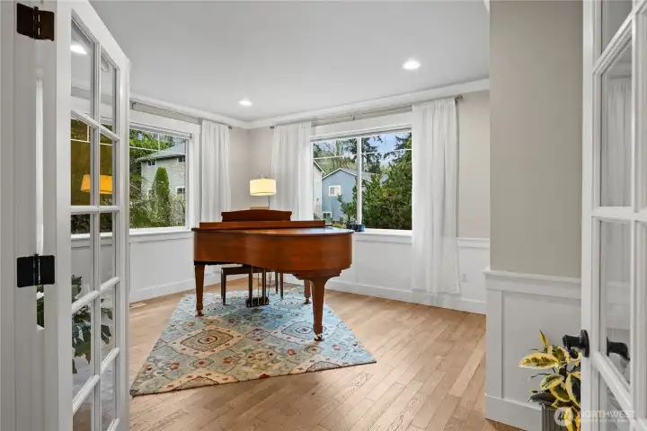 The main floor den is super versatile--  a closet and adjacent 3/4 bath make this a functional 4th bedroom