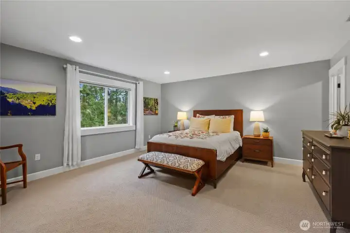 Luxurious primary suite includes ensuite bathroom and 2 walk in closets!