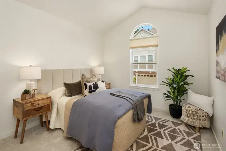 The secondary bedroom overlooks the front of the home. The secondary bedroom overlooks the front of the home.