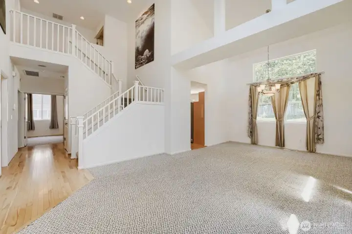 Entryway leading into great room and formal dining room. Entryway leading into great room and formal dining room.