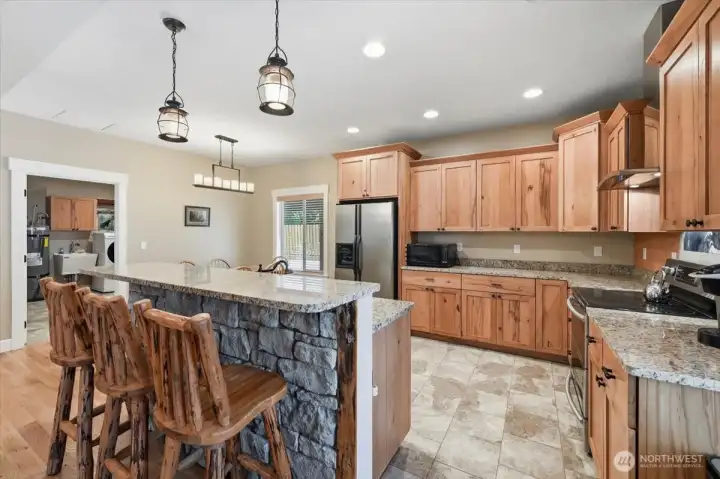 Spacious kitchen with granite island