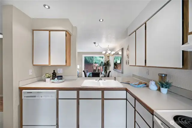 This spacious kitchen seamlessly connects to the dining room which ideal for entertaining. The ample counter space provides a modern and functional breakfast area for two to sit and keep the cook company!
