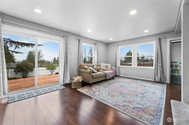 This is the 2nd living room with sliding doors to the deck and yard