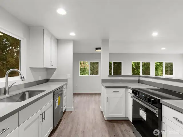 Be the first to whip up a meal in the kitchen. Soft close cabinets, quartz counters, under mount stainless sink!