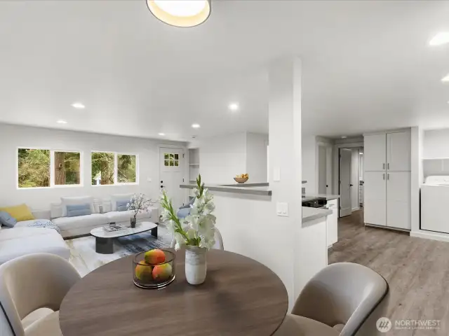 Virtually staged view from Dining to Living area