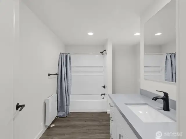 Primary Ensuite full bath - excellent counter space and storage.