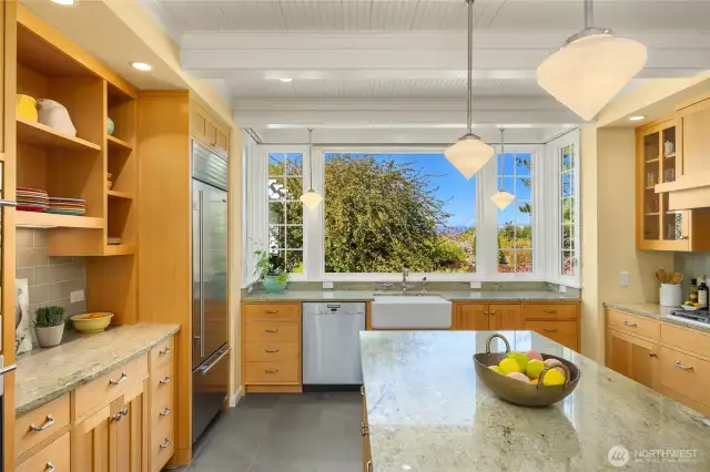 Generous center island and great open shelves.