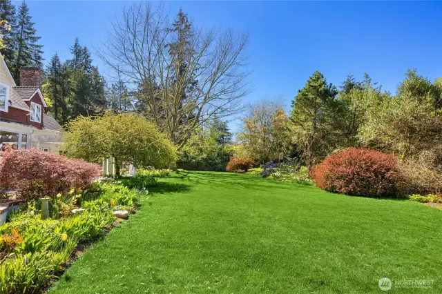 Mature gardens plus lush lawns make this property extra special.